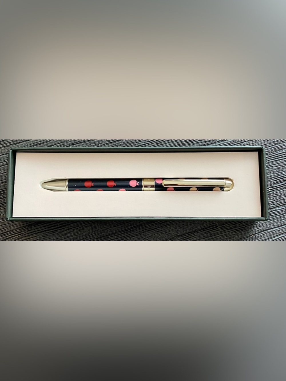 Kate Spade apple motif ink pen with gold accents, new, never used.